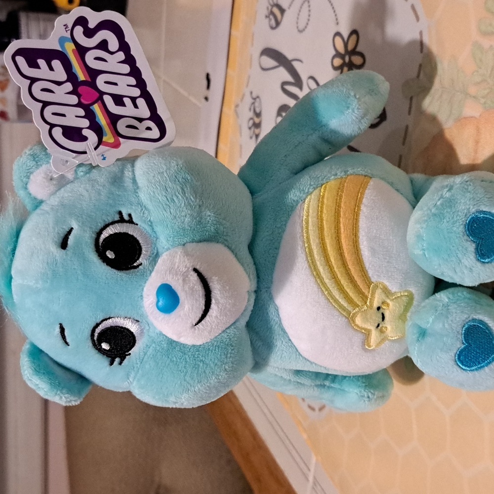Care Bears Light Blue Plush with Yellow Rainbow Star Belly Badge Like New